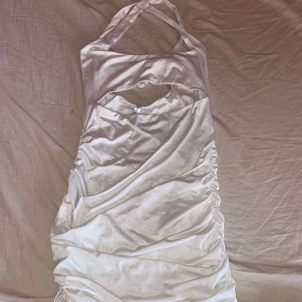 This is a gorgeous white sexy dress from Lucy in the Sky!